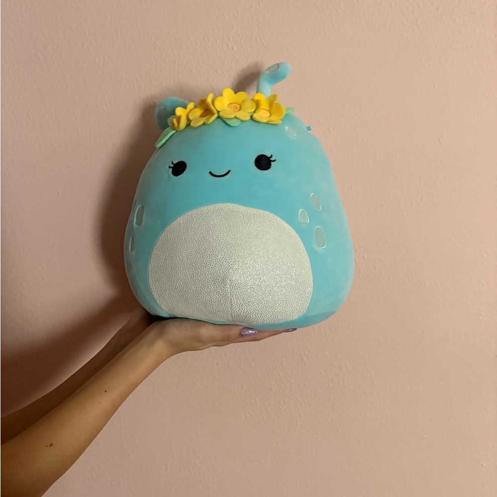 Squishmallows Blue Stuffed Animal with Yellow Flowers
